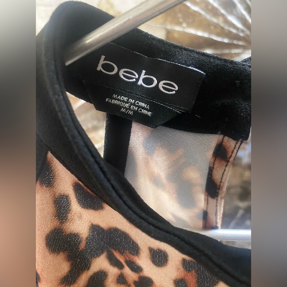 BEBE ANIMAL PRINT COLD SHOULDER TOP. BRAND NEW. SIZE MEDIUM. - Picture 3 of 3